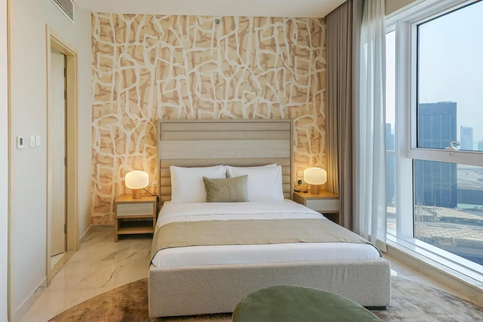 Leaf Tower 1 & 2-bedroom apartment interior – Contemporary design with built-in wardrobes, kitchenettes, and panoramic city views